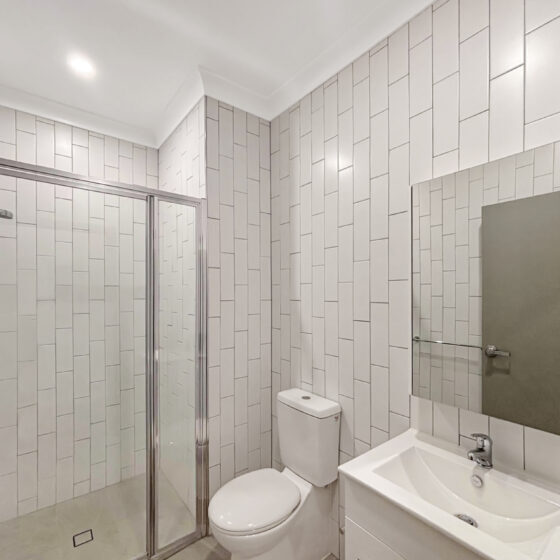 The bathrooms are designed to be accessible with safety rails